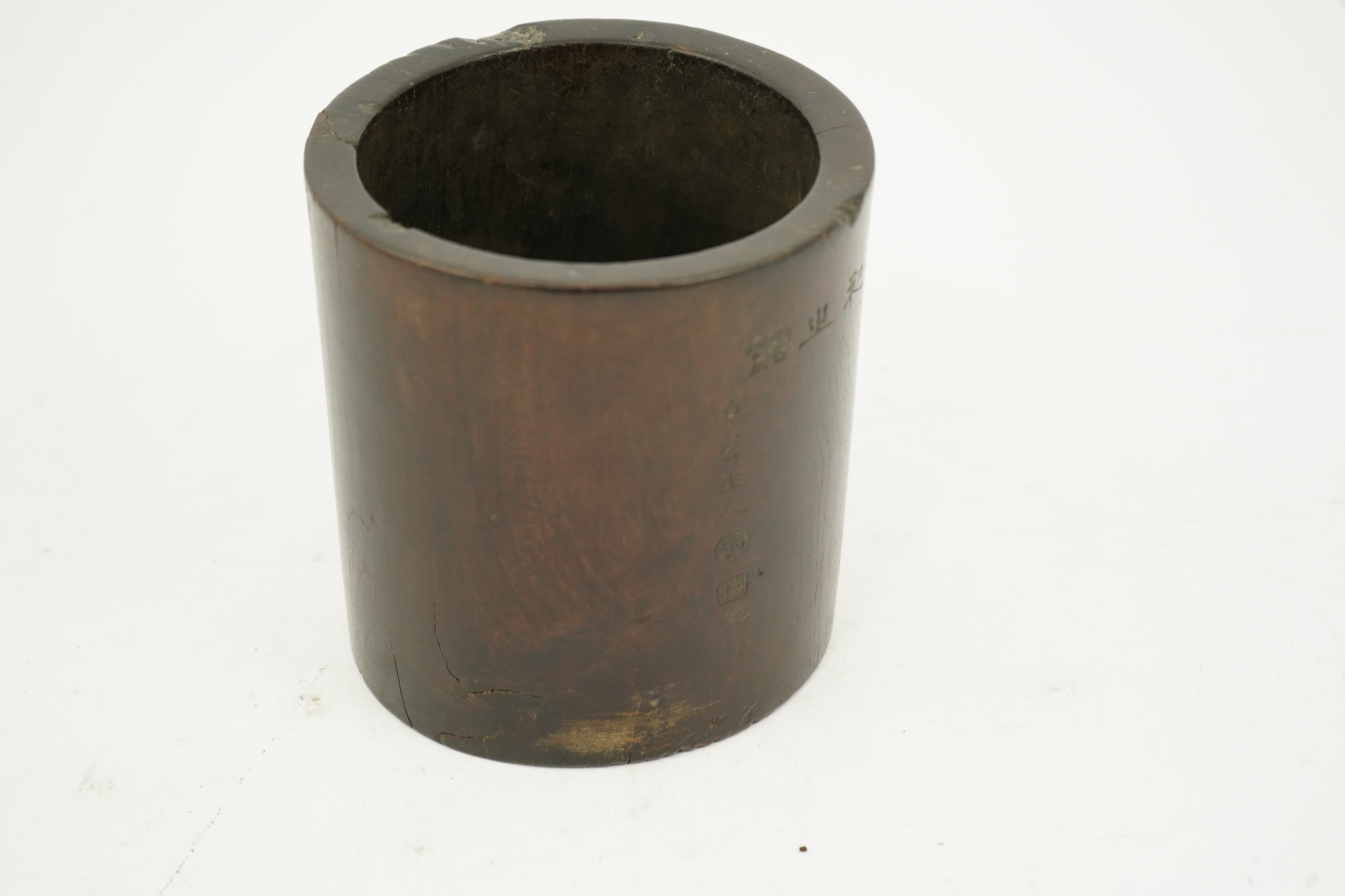 A Chinese inscribed hardwood brushpot, bitong, Qing dynasty